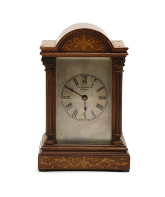 Lot 140 - A walnut and marquetry cased timepiece