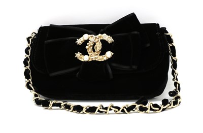 Lot 521 - A Chanel black velvet evening bag