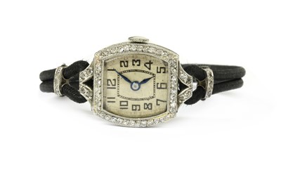 Lot 221 - A Continental diamond set cocktail watch