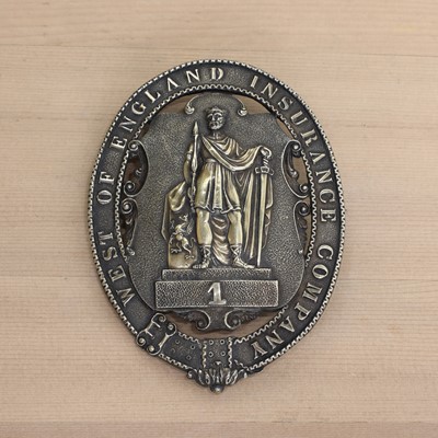 Lot 360 - A William IV silver-gilt West of England Insurance Company fireman's badge