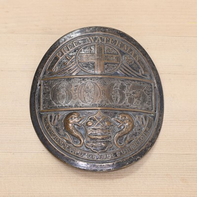 Lot 364 - A silver-plated copper Free Waterman badge