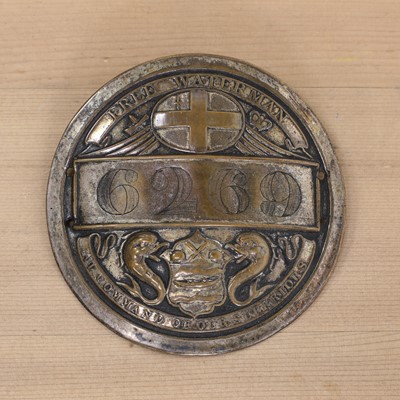 Lot 370 - A silver plate on copper Free Waterman fireman's badge