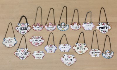 Lot 423 - A collection of seventeen enamel wine labels