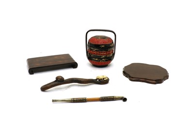 Lot 128 - A Japanese carved wooden snake okimono