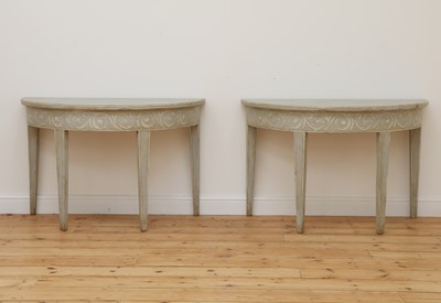 Lot 491 - A pair of Swedish Gustavian-style painted demilune side tables