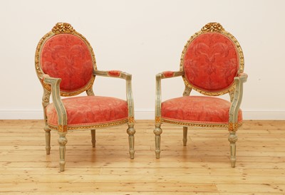 Lot 137 - A pair of Louis XVI-style painted and parcel-gilt fauteuils
