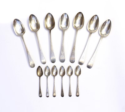 Lot 34 - A small collection of Georgian silver bright-cut engraved tablespoons