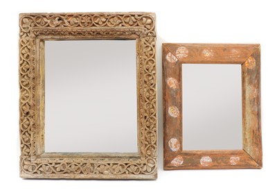 Lot 149 - A carved hardwood mirror