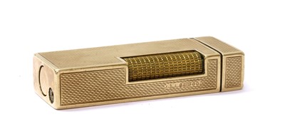 Lot 283 - A 9ct gold gas lighter