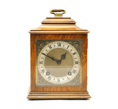 Lot 297 - An early 20th century walnut cased two train mantel clock