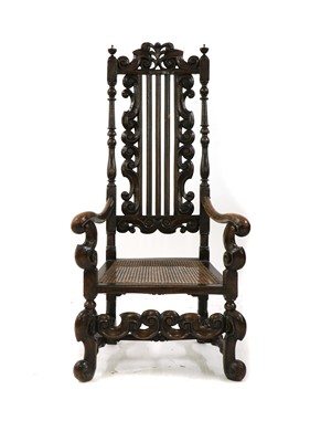 Lot 559 - A carved beech open armchair