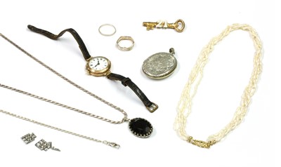 Lot 234 - A 9ct gold pin set mechanical strap watch
