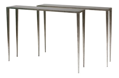 Lot 459 - A pair of contemporary moulded aluminium console tables