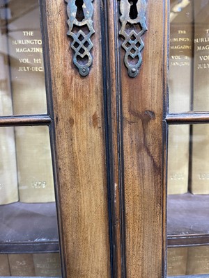 Lot 53 - A George III mahogany secretaire breakfront bookcase