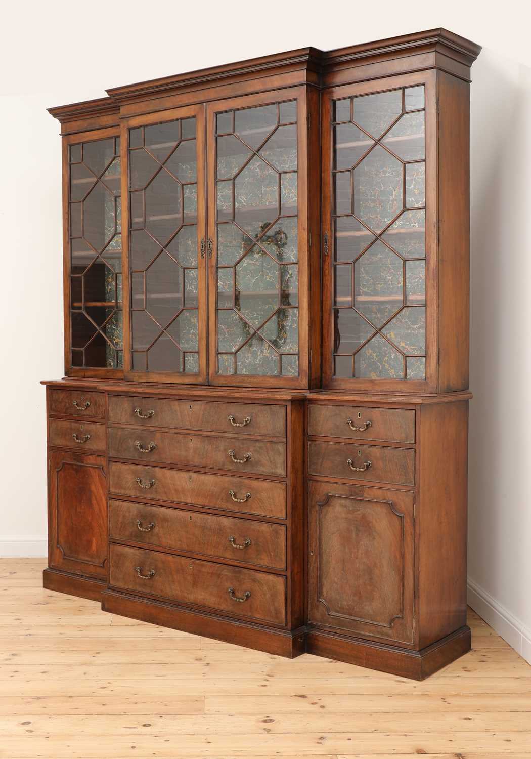 Lot 53 - A George III mahogany secretaire breakfront bookcase