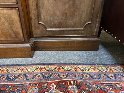 Lot 53 - A George III mahogany secretaire breakfront bookcase