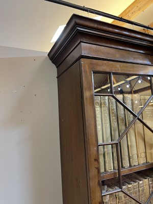Lot 53 - A George III mahogany secretaire breakfront bookcase