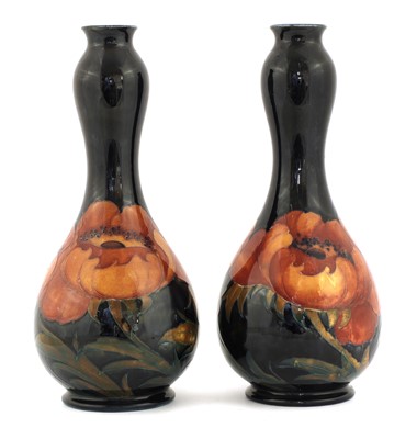 Lot 345 - A pair of William Moorcroft 'Big Poppy' vases