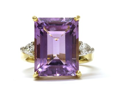 Lot 193 - An 18ct gold amethyst and diamond three stone ring