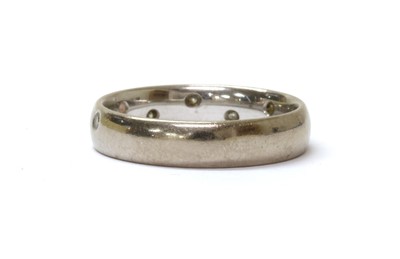Lot 74 - An 18ct white gold diamond set wedding ring