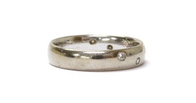 Lot 74 - An 18ct white gold diamond set wedding ring