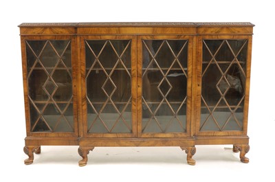 Lot 573 - An early 20th century walnut dwarf bookcase
