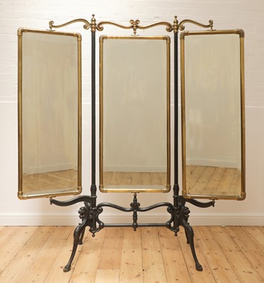 Lot 280 - A cast iron and brass triptych cheval mirror