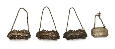 Lot 52 - A set of three silver decanter labels
