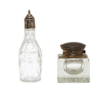 Lot 43 - A glass inkwell with silver mounts