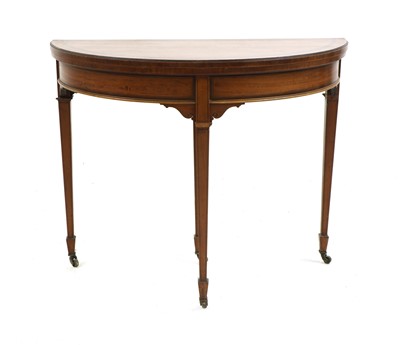 Lot 502 - An Edwardian satinwood demi lune card table