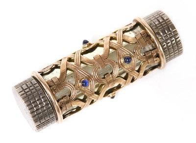 Lot 235 - A silver, gold and sapphire set lipstick holder, attributed to Boucheron