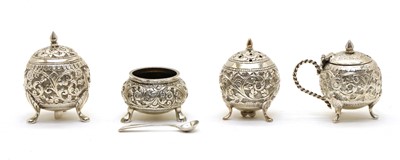 Lot 42 - A four-piece Indian silver cruet set