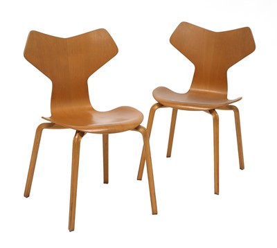 Lot 591 - A pair of teak 'Grand Prix' chairs