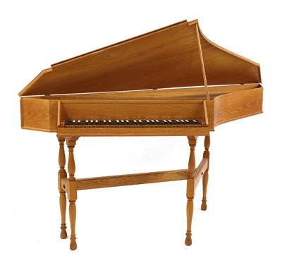 Lot 236 - An oak spinet piano