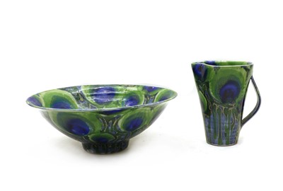 Lot 99 - A Dartington stoneware 'Peacock' jug and basin