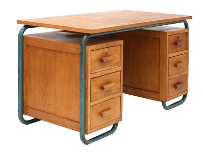 Lot 324 - An oak and tubular-framed desk