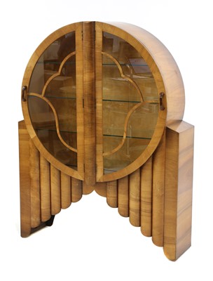 Lot 240 - An Art Deco walnut 'Rocket' display cabinet