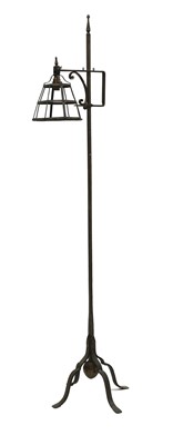 Lot 128 - An Arts and Crafts wrought iron standard lamp