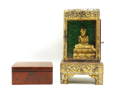 Lot 124 - An Indian gilt lacquered Buddha