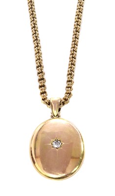Lot 65 - A Victorian gold diamond set locket and chain