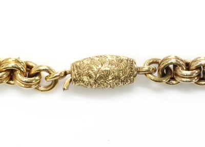 Lot 65 - A Victorian gold diamond set locket and chain