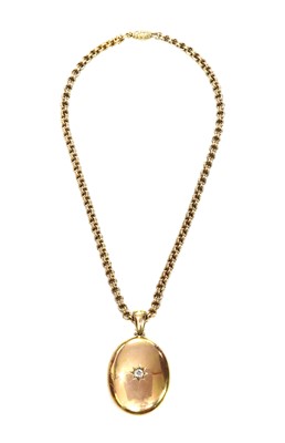 Lot 65 - A Victorian gold diamond set locket and chain