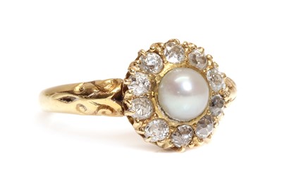 Lot 143 - A gold late Victorian pearl and diamond circular cluster ring