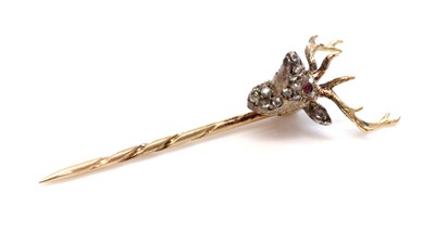 Lot 94 - A diamond set stag head stick pin