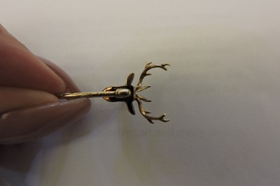 Lot 94 - A diamond set stag head stick pin