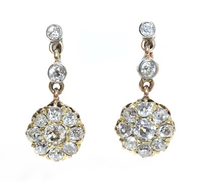 Lot 187 - A pair of Edwardian diamond set drop earrings