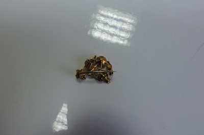 Lot 38 - A Regency gold gem set posy brooch