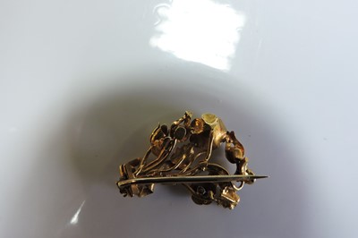 Lot 38 - A Regency gold gem set posy brooch