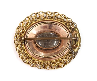 Lot 40 - A gold split pearl oval memorial brooch, c.1810-1820