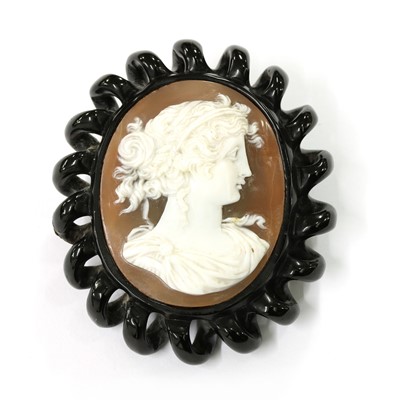 Lot 30 - A jet cameo brooch/pendant